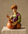 Rhythmic Folk Drummer Traditional Musician Figurine
