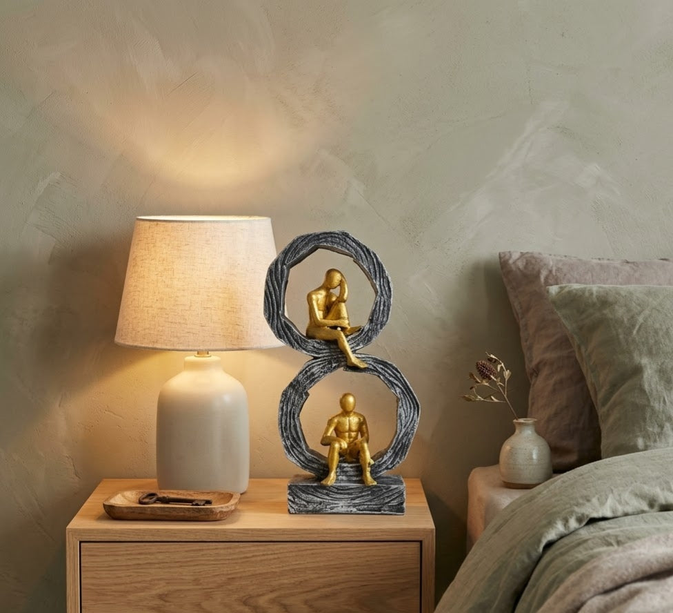 Golden Thoughtful Silhouette Circular Ring Sculpture