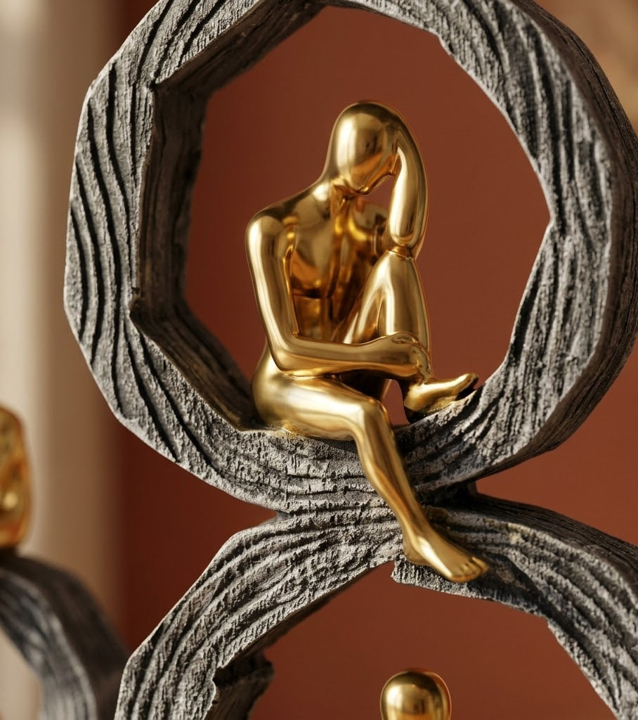 Golden Thoughtful Silhouette Circular Ring Sculpture